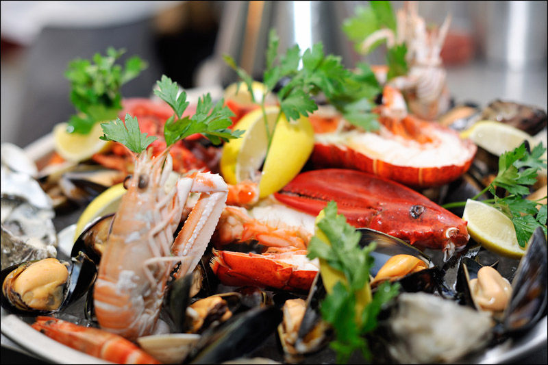 Seafood platter at The Regency restaurant. Prawns, squid, lemon and parsley on a platter. 