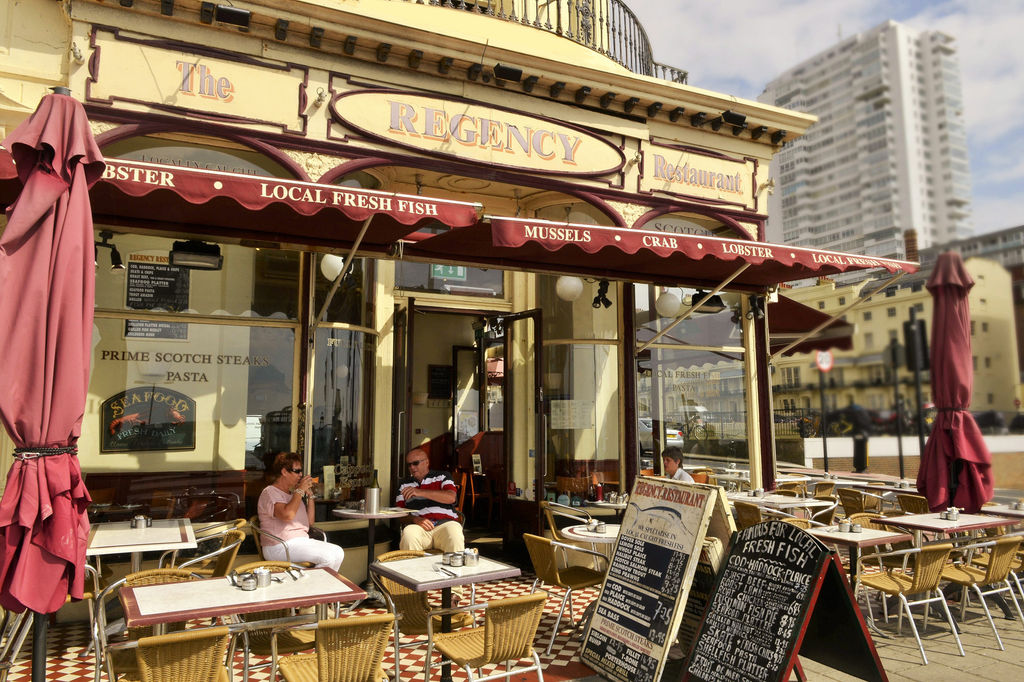 The historic Regency restaurant on Brighton seafront . Alfresco chairs and tables. Outdoor seating and alfresco dining opposite the i360. Seafront Restaurants