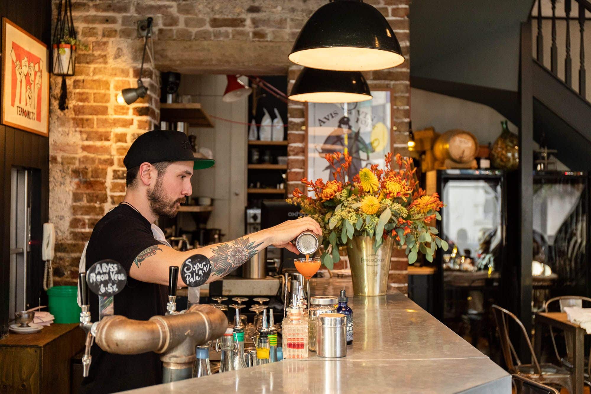 bartender preparing drinks at Plateau Brighton