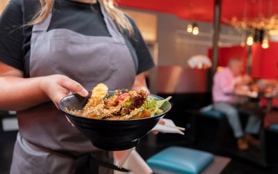 waiter holding food bowl