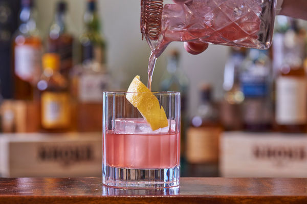 pink cocktail drink in a short glass