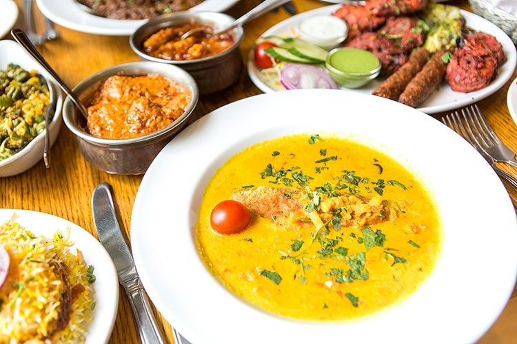 A banquet of Indian food and curries at Chaula's Brighton restaurant
