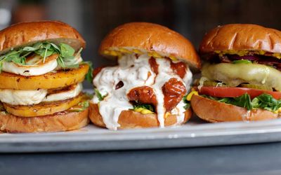 Trio of burgers at The Breakfast Club