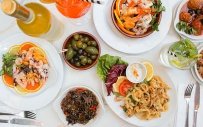 over head shot of table laid out with italian dishes