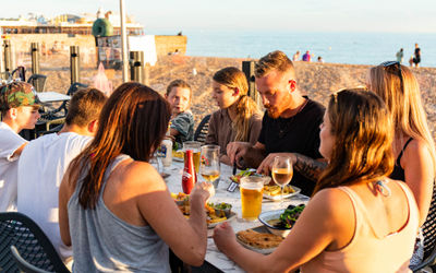 family eating by the table on the Ohso terrace