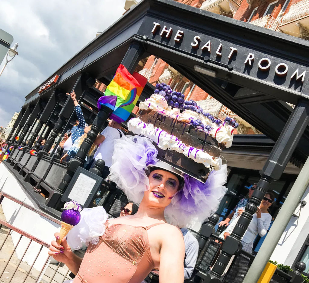 drag queen in front of the salt room