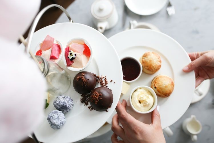 Afternoon tea with scones, chocolate truffles and a rhubarb dessert. Brighton afternoon tea at a Brighton restaurant