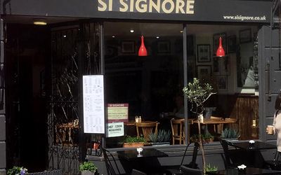 Exterior photograph taken of Si Signore and the alfresco seating