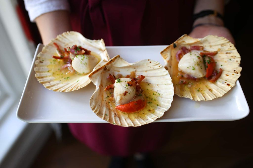 Scallops being served at Limes of Lindfield