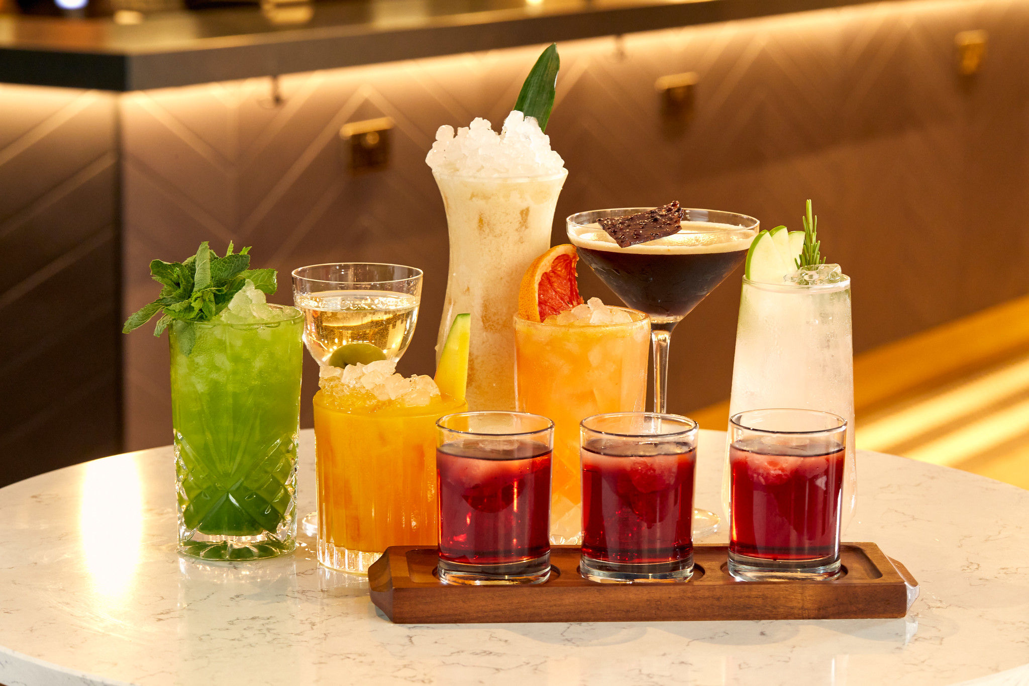 eight different types of cocktails served on the table