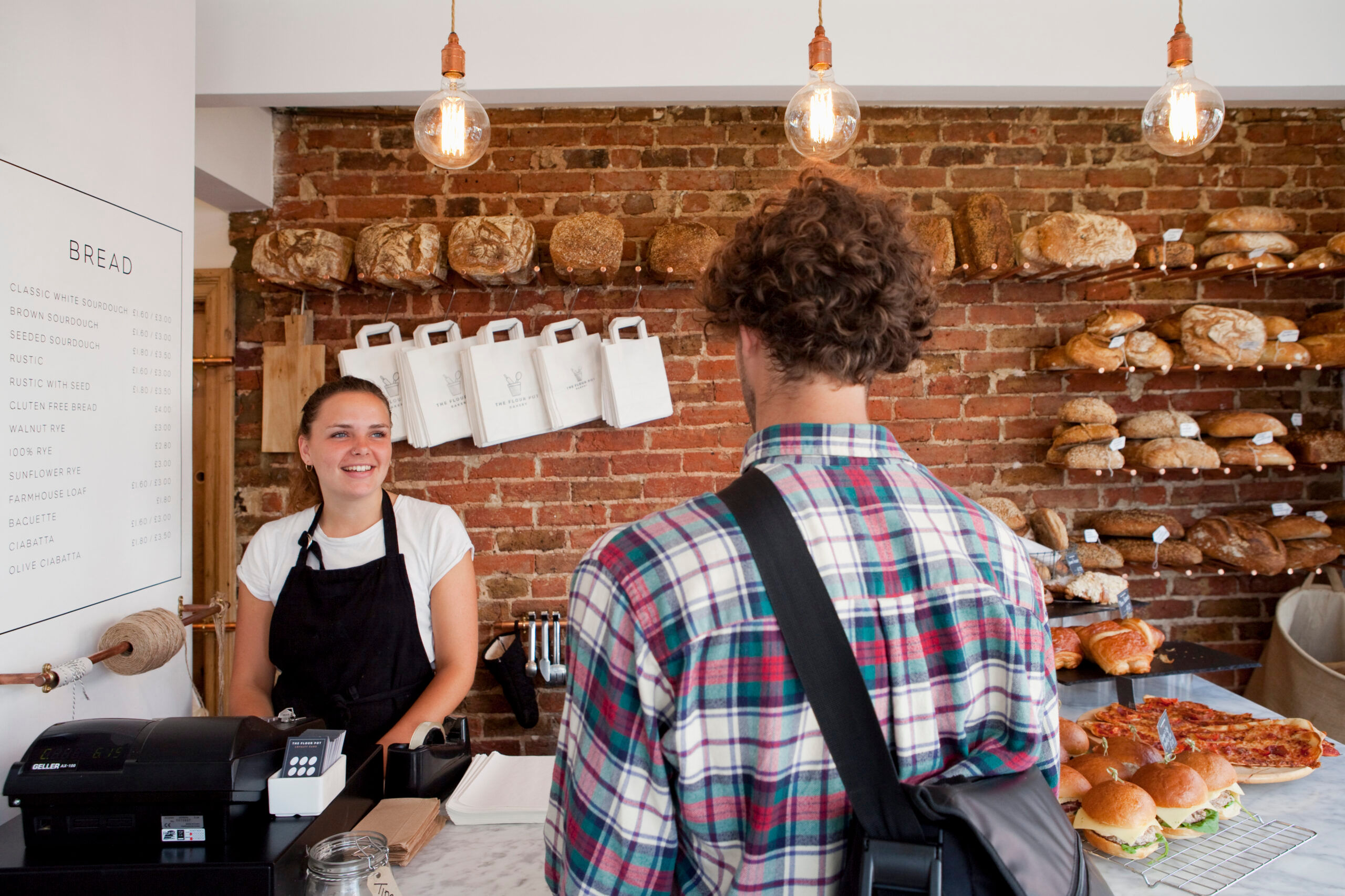 man buying pastry at the flour pot