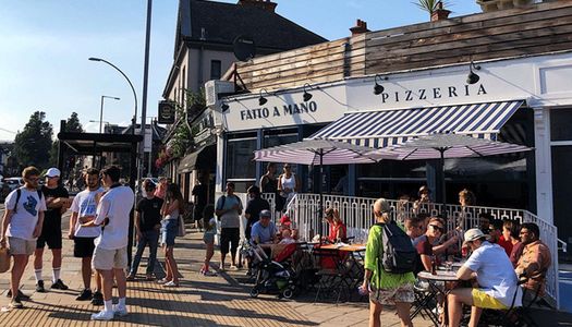 A busy Fatto A Mano in Preston Circus. Located on London Road in Brighton. a summery picture with blue sky. Fatto a Mano Preston Circus • Artisan Pizza with a Community Feel