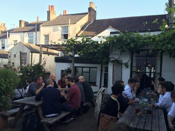 regulars enjoying the sunny Brighton beer garden