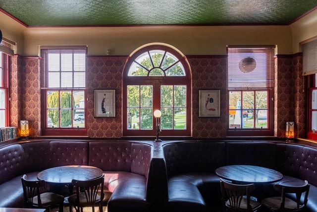 Inside of a pub with red walls
