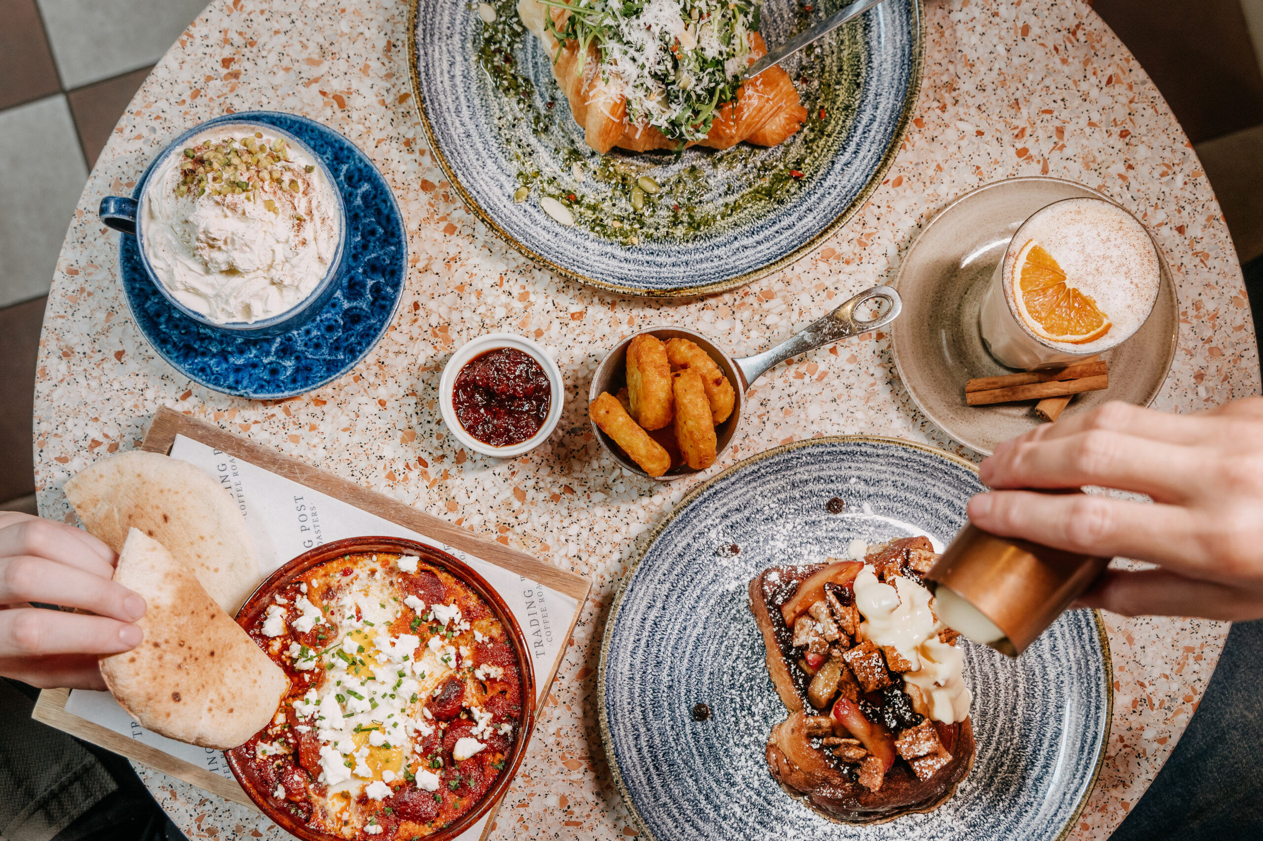 over head shot of the table laid out with brunch dishes at Trading Post Coffee