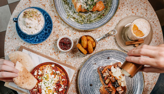 over head shot of the table laid out with brunch dishes at Trading Post Coffee