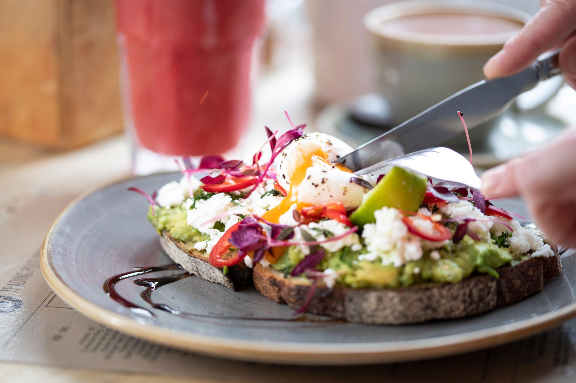 yolk being popped on the top of the toast. Trading Post Brighton