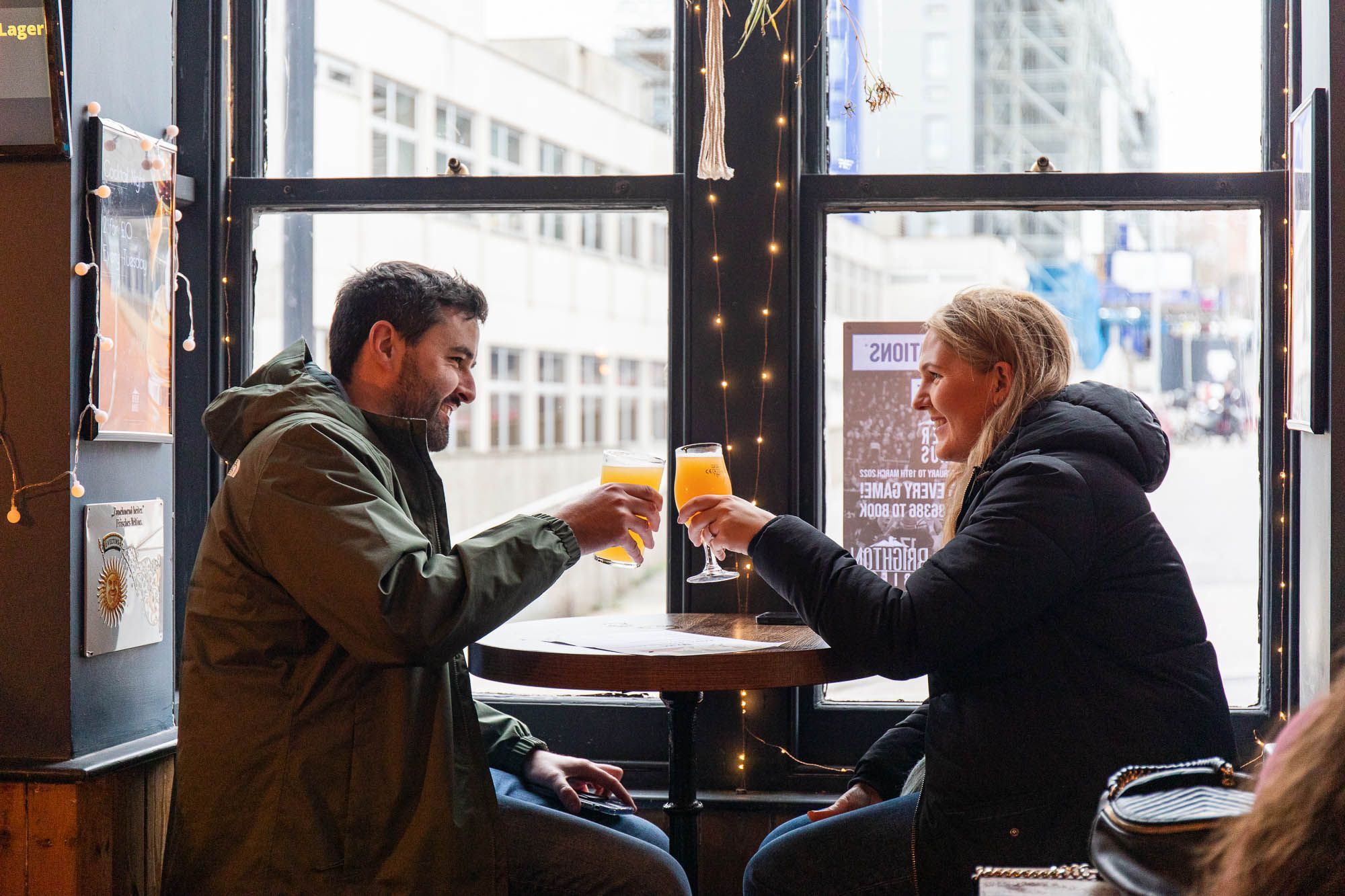 couple having a toast at Brighton Bierhaus