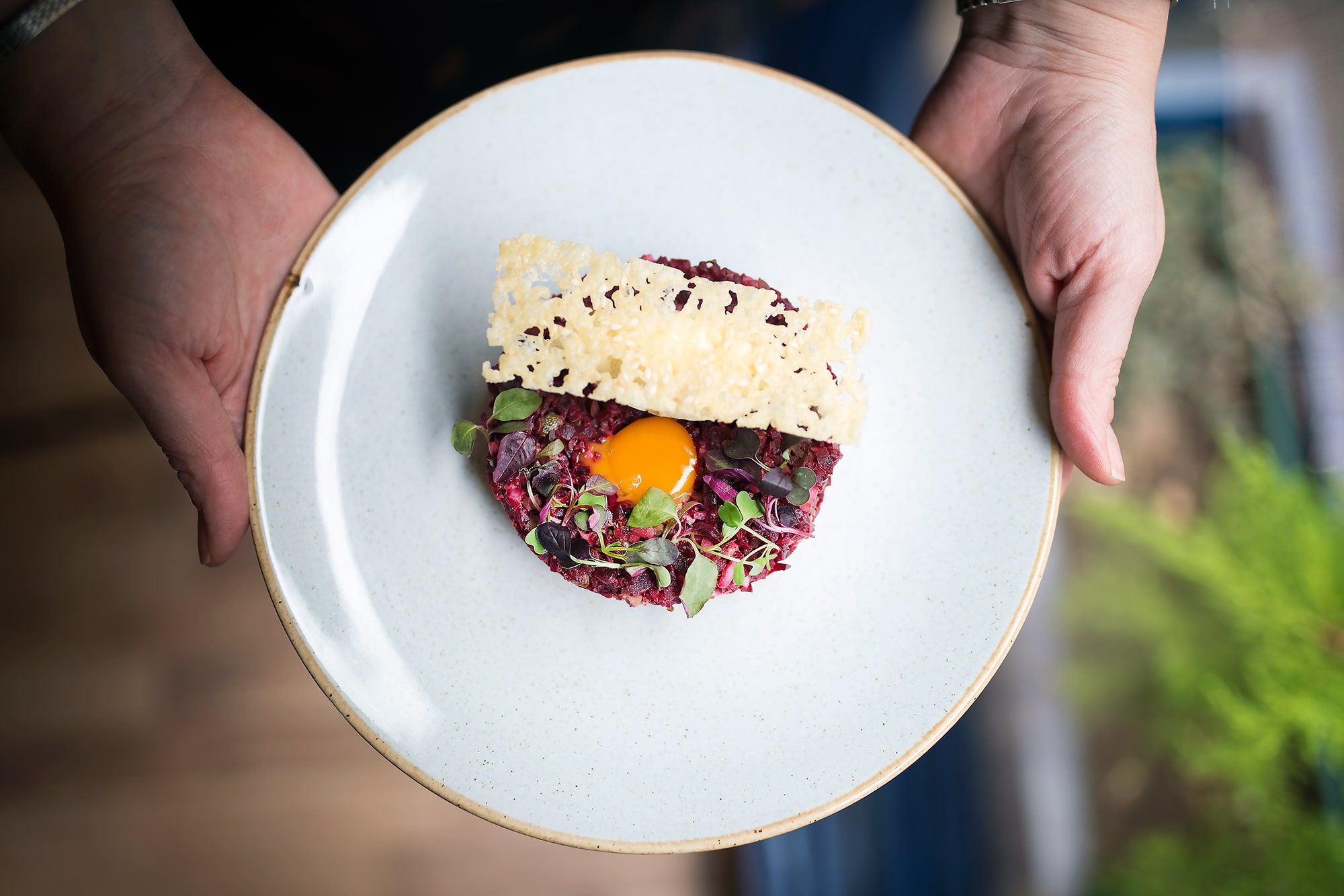 Beetroot tartare, horseradish cream, quail egg yolk and Comté crisp