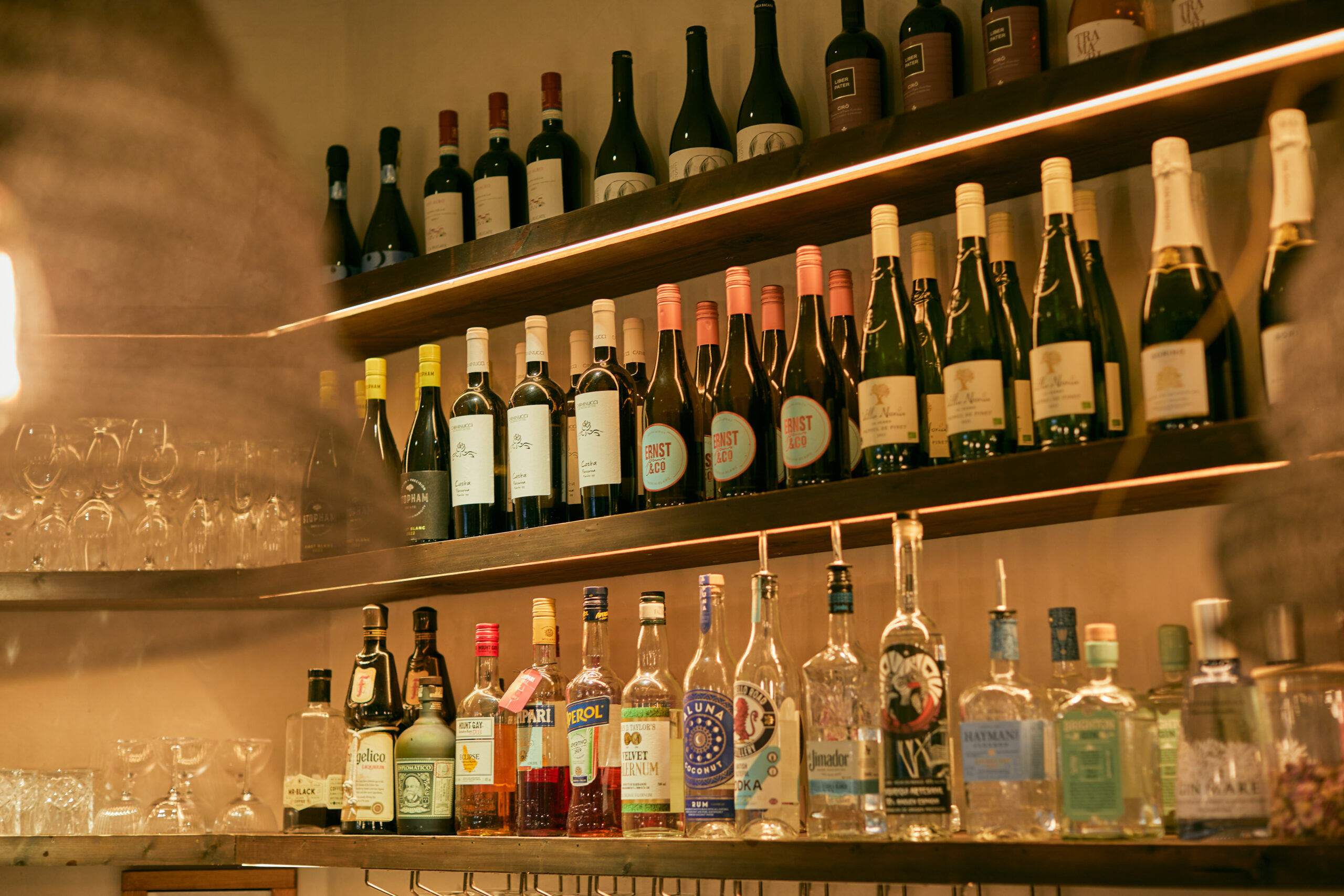 shelves with various drinks 