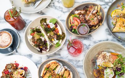 table laid out with many dishes, Brighton brunch