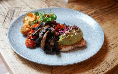 Vegan brunch at Lost in the Lanes Brighton, guacamole, field mushrooms, roasted peppers and potatoes