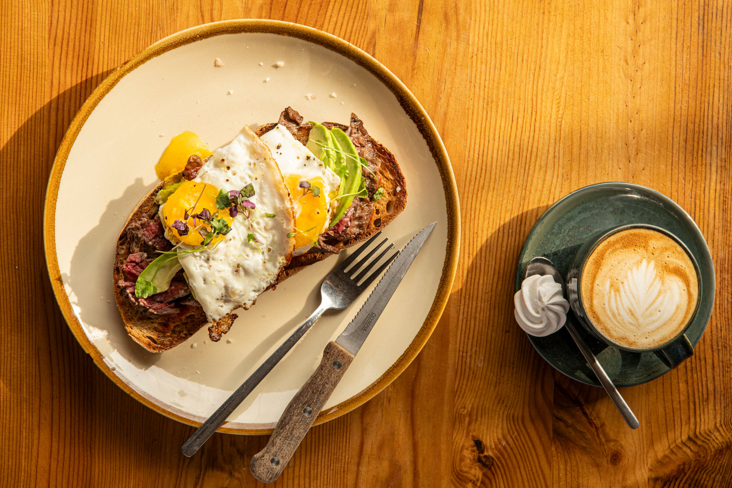egg on toast served with flat white coffee at Mange Tout Brighton