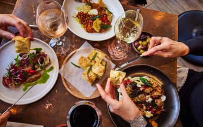 over head shot of the people enjoying their lunch at the lost in the lanes. Romantic Restaurants Brighton. Part of our round up of Places to eat in Brighton