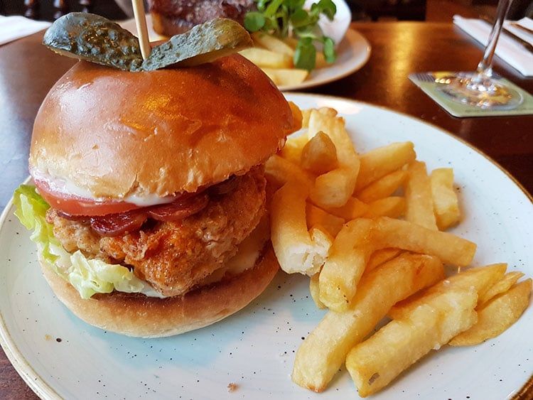 Chicken burger and chips at The Plough Inn