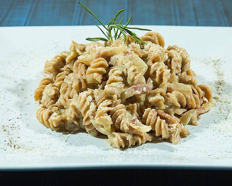 creamy pasta with rosemary garnish at Hove restaurant, Semola Restaurant Hove