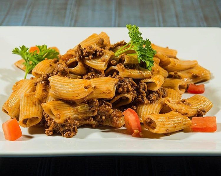 tomato and meat pasta with parsley at Semola, Hove