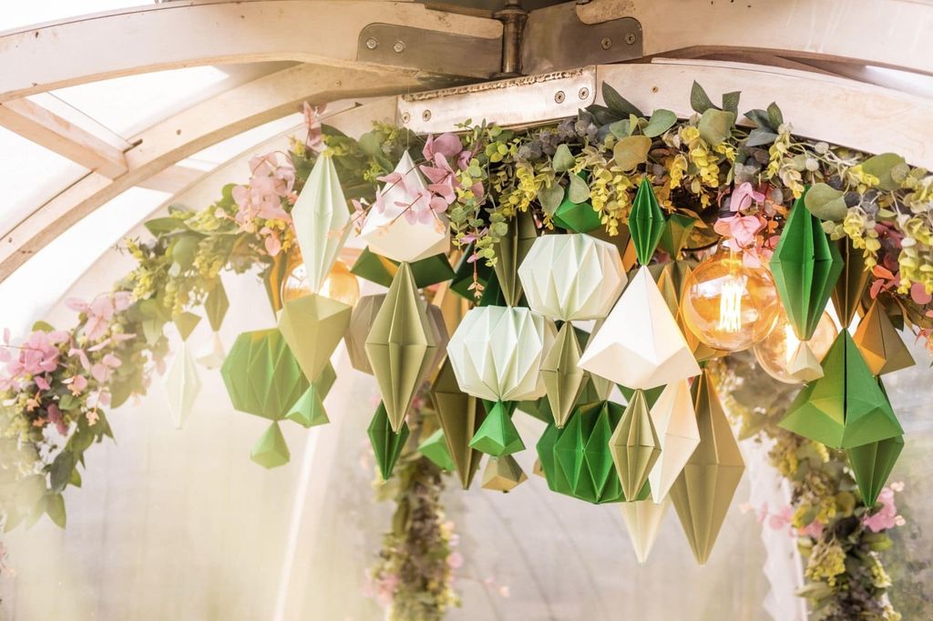 Autumn igloo installation at The Coppa Club, a hanging arrangement of paper sculptures and foliage 