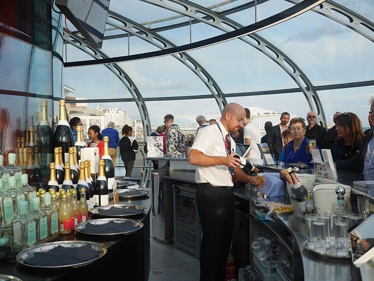 Bar and people inside the BAi360 - Brighton i360 