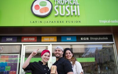 Tropical Sushi. The Tropical susjhi team stood outside celebrating their Brighton Restaurant Awards victory