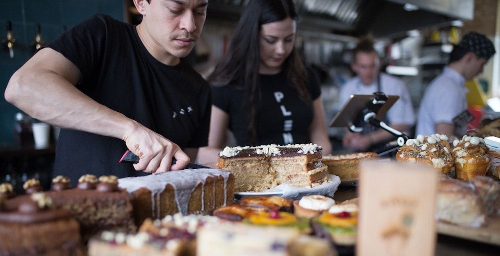 Staff and cake at Cafe Plenty