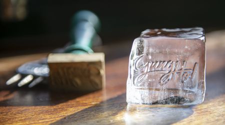 A block of Ice with the GungHo logo stamped into it with the stamper in the background