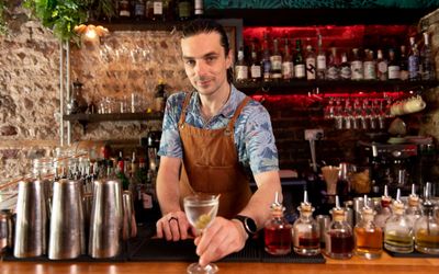 gungho bartender with cocktail in hand