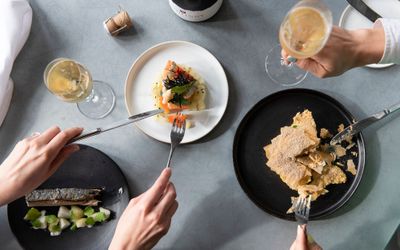 overhead shot of the two people eating by the table