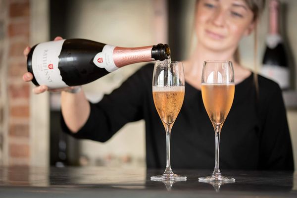 bartender pouring wine