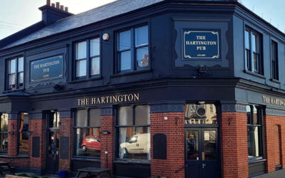 The black exterior of the Hartington pub in Brighton