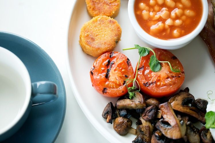 Breakfast in Brighton UK. Full English with tomatoes, mushrooms and baked beans