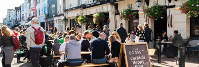 outdoor seating populated with people at the Dorset. North Laine Brighton
