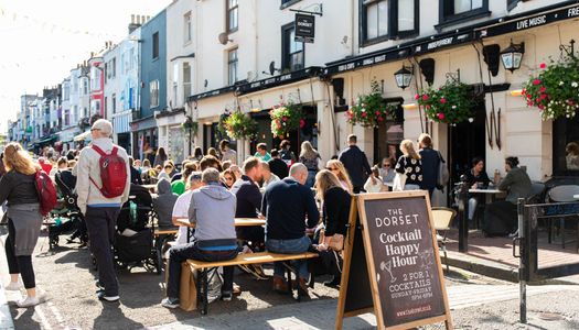 outdoor seating populated with people at the Dorset. North Laine Brighton