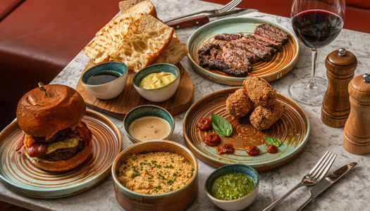 Lunch in Brighton. A selection of dishes including steak and burgers at Kindling restaurant in the lanes.