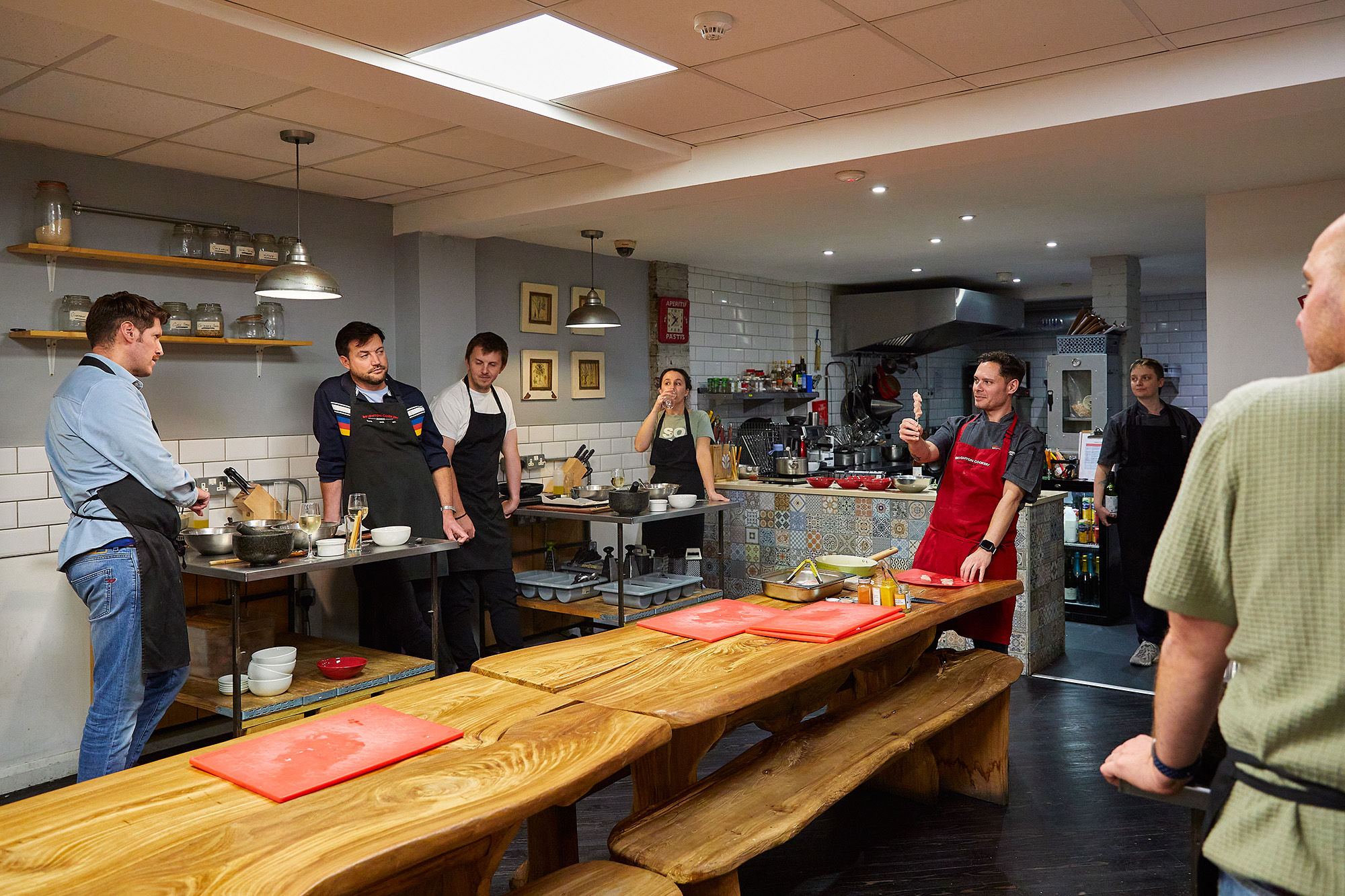 chef Victor talking to participants of the Brighton Cookery School cooking class
