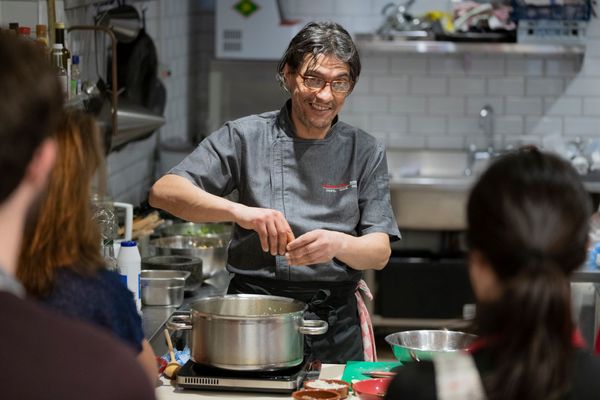 chef Ben smiling while educating others on cooking