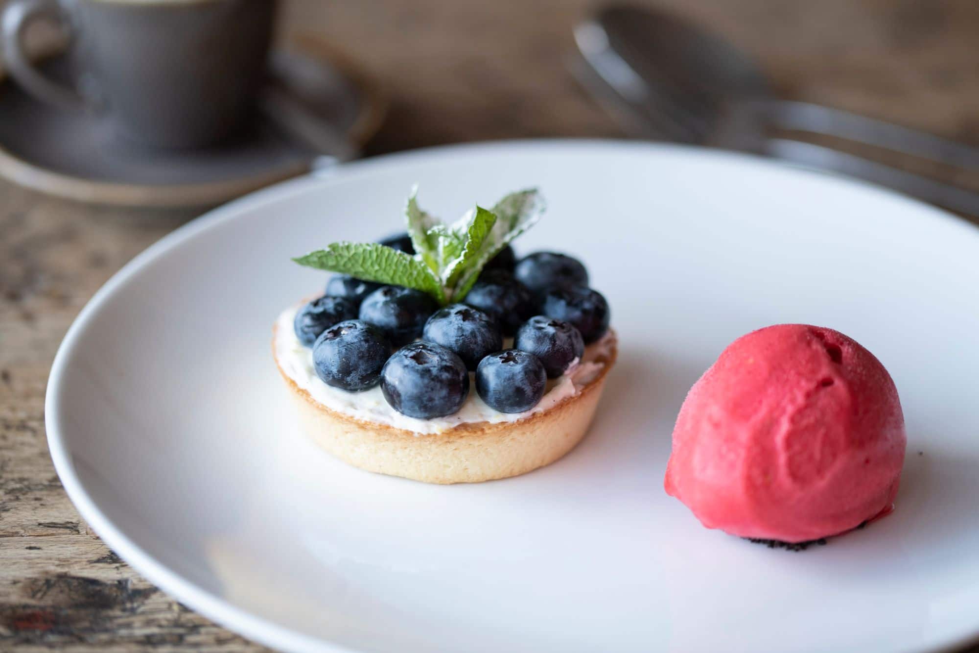 blueberry cake with scoop of ice cream. Morleys Bistro Hurstpierpoint dessert