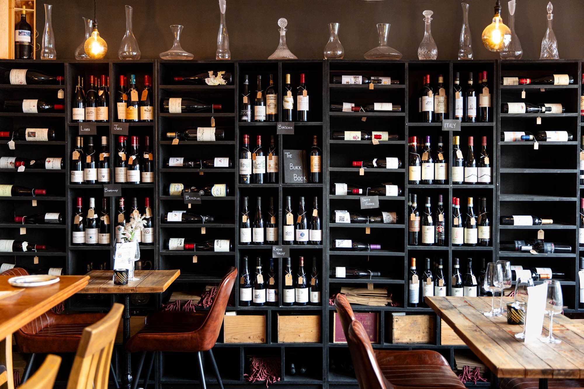 massive shelves filled with wine at Cases Hove