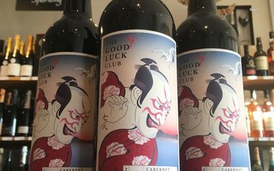 Three bottles of Cabernet Sauvignon with a Japanese illustration on the label