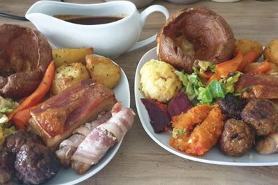 Two Sunday Roasts from The Ladies Mile Kitchen, pork, pigs in blankets, roast potatoes, Yorkshire puddings veg and gravy